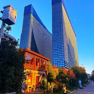 Orbi City Апартаменты